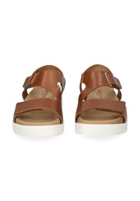 Brown leather sandals with two adjustable straps, open toe design, and white rubber sole. Features a smooth texture and light padding.