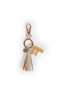 Portachiavi in oro e argento con un nastro texturizzato e la lettera "T" glitterata. Morsetto e anello in metallo per il fissaggio, design minimalista.