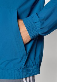 adidas Originals MINNESOTA UNITED ORIGINALS ANTHEM JACKET - Fanartikel - legend marine/white