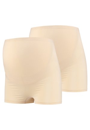 Shorts de maternité beiges en tissu lisse, avec une taille haute offrant un aspect sans coutures et une bande incurvée texturée en haut.