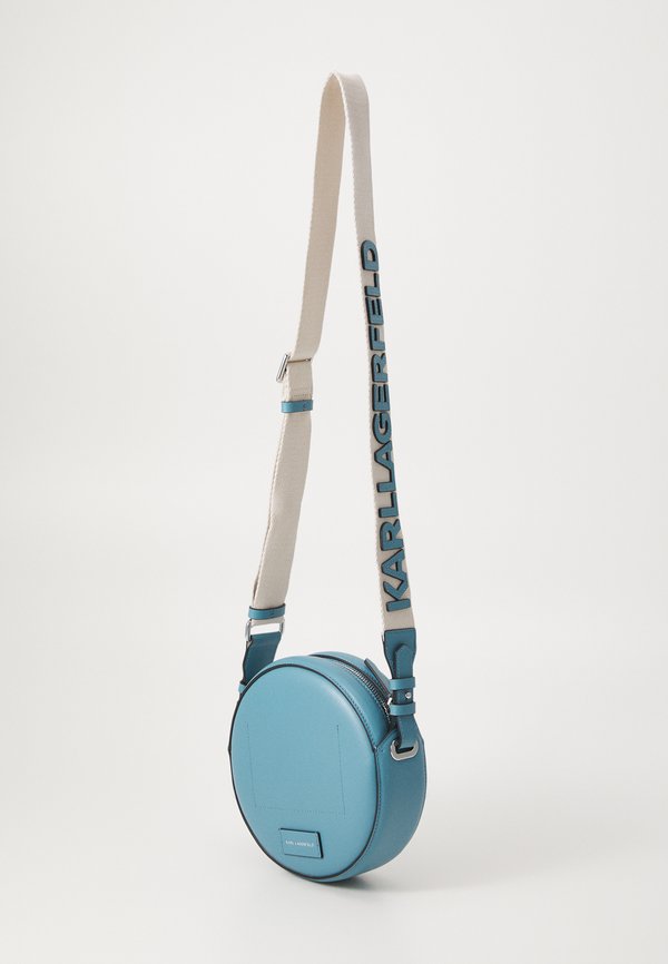 CIRCLE ROUND PERFORATED - Cross body bag - turquoise2