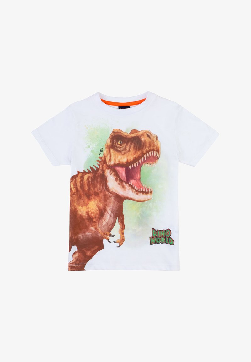 Maglietta bianca in cotone con una grande grafica di un T-Rex che ruggisce, con accenti di vernice verde e il testo "DINO WORLD" in una scritta colorata.