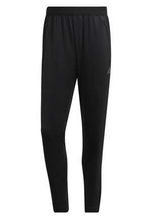 Zwarte sportieve slanke broek met een elastische tailleband en met rits afsluitbare zijzakken, met een klein Adidas-logo op de linker dij.