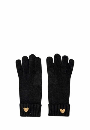 Guanti neri lavorati a maglia con cinque dita, dotati di un polsino a coste e un piccolo accento a forma di cuore dorato sul polso. Texture morbida su tutta la superficie.