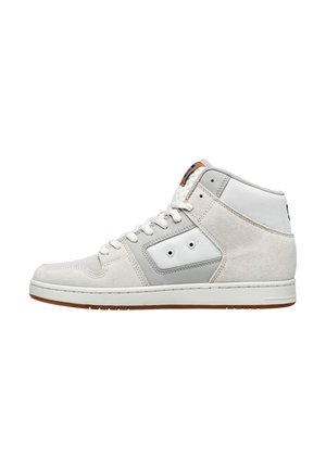 High-top sneaker in beige suede with gray accents, white mesh panel, and rubber sole. Features a lace-up design and padded collar.