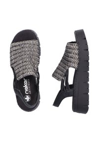 Sandales noires avec un upper en textile tissé, présentant un design à bout ouvert et une semelle épaisse. La texture est tressée, offrant un look décontracté.