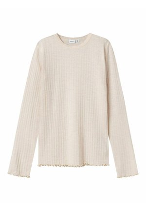 Maglietta a maniche lunghe, beige, a coste con un motivo testurizzato, collo rotondo e orlo e polsini con volant, realizzata in un tessuto morbido.