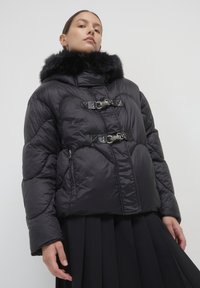 Calliope IMBOTTITO CON ALAMARI - Giacca invernale - nero