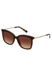 Oversized brown tortoiseshell sunglasses with gradient lenses. Gold-tone metal arms feature "Michael Kors" branding. Smooth, glossy finish.