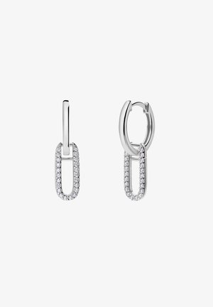 Silver hoop earrings with a paperclip design, featuring a row of clear gemstones along the front. Polished finish, modern aesthetic.