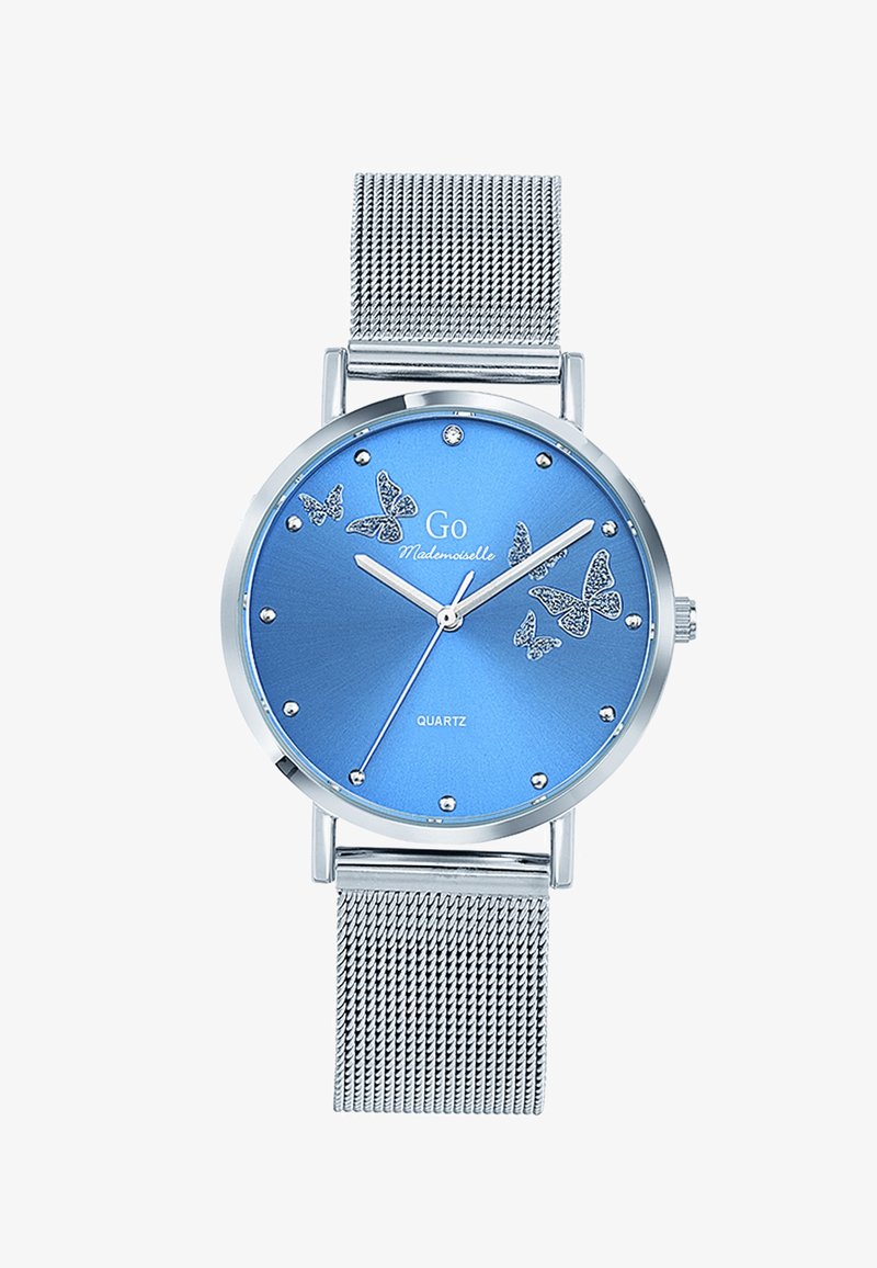 Montre à quartz avec un cadran métallisé bleu, bracelet en maille argentée, ornée de motifs de papillon et d'accents en cristal autour du cadran.