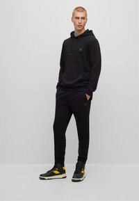 BOSS SESTART - Tracksuit bottoms - black