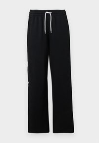 Black sweatpants made of soft cotton, featuring an elastic waistband with a white drawstring and a loose fit. No notable patterns or accents.