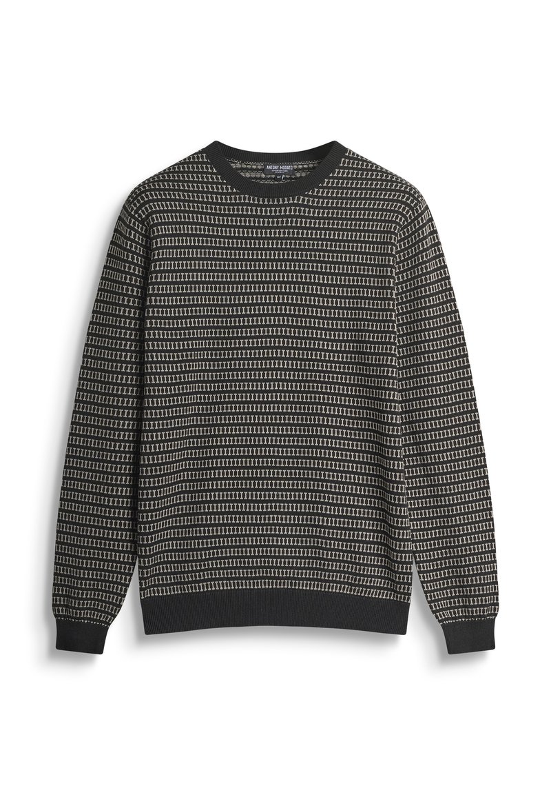 Pletena džemper u crnoj boji s geometrijskim uzorkom u sivoj. Ima okrugli izrez i dugačke rukave s rebrastim manžetama i rubom.