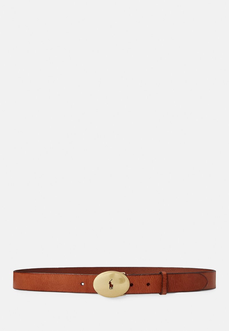Tan leather belt with a smooth finish, featuring a gold oval buckle embossed with a logo. Classic design with adjustable notches along the strap.
