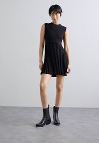 sandro SCORPION - Vestido de punto - noir