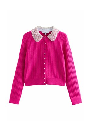 Fuchsia ribbed cardigan featuring a decorative white collar with circular fabric accents and pearl-like buttons at the front.
