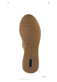 Semelle de chaussure en caoutchouc avec un design de tread texturé, présentant des stries horizontales, un bout arrondi, et un logo en relief près du talon. Couleur : beige.