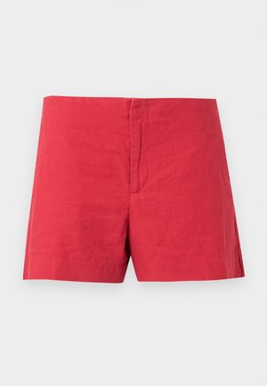 Κόκκινα βαμβακερά σορτς με επίπεδη μπροστινή όψη και κρυφή φερμουάρ, παρουσιάζονται σε απλό ανοιχτό φόντο.