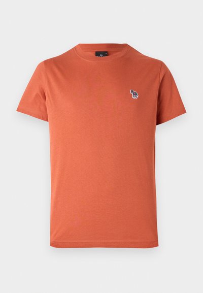 Orange cotton T-shirt with short sleeves, crew neck, and a small, multicolored embroidered design on the left chest.