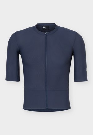 Tumesinise värvusega lühikeste varrukatega rattasärgi eesmine lukk ja ümar krae, disainitud keha järgiva spordistiili jaoks.