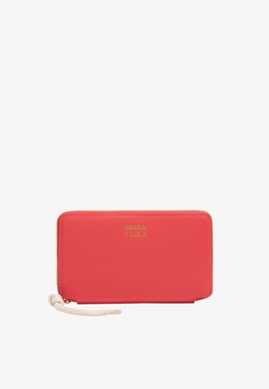 Coral rectangular wallet with gold "BIMBA Y LOLA" logo, zipper closure, and attached white braided wrist strap.