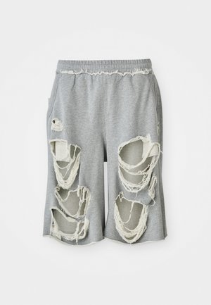 Sivi bombaž kratke hlače z izrazitimi raztrganinami in razfrkanimi robovi. Ima elastičen pas in sproščen kroj.