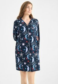 Navy nightgown with a moon and star pattern, featuring white piping, a collar, and full-length sleeves. Made from soft fabric.