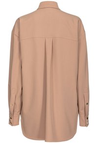 Chemise beige à manches longues vue de l'arrière avec un pli central, des poignets boutonnés et un col classique.