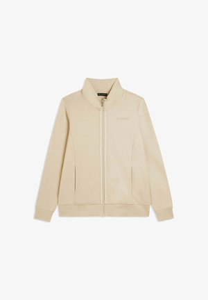 Sweatshirt zippé beige avec un col montant, des poches latérales et des poignets côtelés. Détail de logo discret à l'avant. Texture douce et lisse.