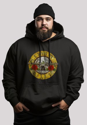 Black hoodie made of cotton blend featuring a circular graphic with yellow, black, and red accents, depicting roses and a central logo.