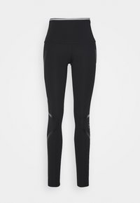 Czarne legginsy sportowe z wysokim stanem, z delikatnymi błyszczącymi akcentami na udach i łydkach, wyeksponowane na jednolitym białym tle.