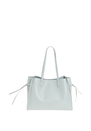 Borsa tote in pelle grigio chiaro con doppi manici, lacci laterali e un piccolo logo dorato centrato vicino alla parte inferiore frontale.