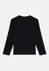 Black long-sleeve crewneck shirt laid flat, showing the back side, with simple, clean design and no visible logos or patterns.