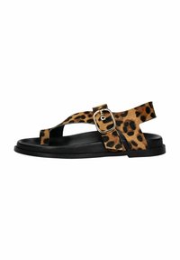 Sandali piatti con stampa leopardata, suola in gomma nera, cinturino regolabile con fibbia dorata, design aperto e tessuto testurizzato.