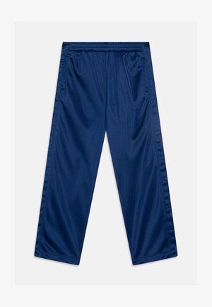 Pantalones azul marino de corte holgado con cintura elástica, piernas rectas y detalles sutiles en la costura lateral, colocados planos sobre un fondo claro.