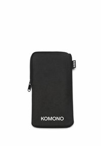 Pochette zippée noire en tissu texturé, avec un logo "KOMONO" blanc en bas et une petite étiquette sur le côté.