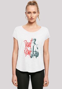 White short-sleeve t-shirt featuring a graphic print of a figure and "David Bowie" in red, with a relaxed fit and soft texture.
