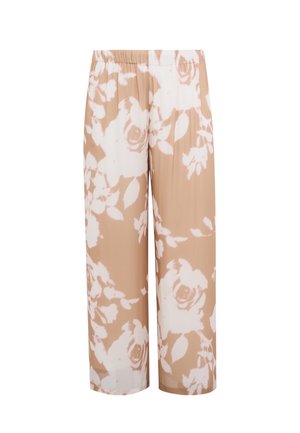 Beige Hosen mit weitem Bein und elastischem Bund, mit großen weißen Blumenmustern über den gesamten Stoff.