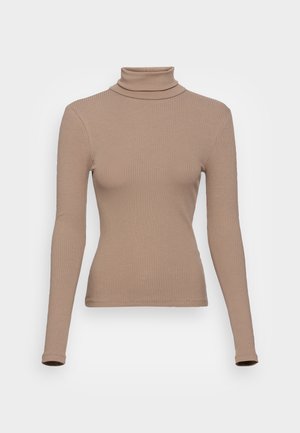 Beige ribbed turtleneck top with long sleeves, fitted design, and a high collar. Smooth texture with no visible patterns or accents.