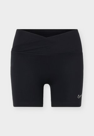 Czarne spodenki sportowe z krzyżowanym pasem i małym białym logo Nike swoosh na lewej nodze na jednolitym tle.