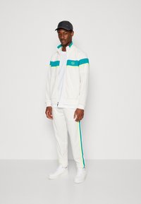Sergio Tacchini DAMARINDO TRACKSUIT SET - Trainingspak - vanilla ice/blue grass