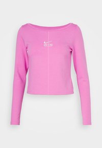 Long-sleeve cropped top in bright pink cotton with a wide neckline. Features a white Nike logo and "AIR" graphic on the front.