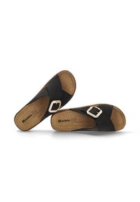Infradito nere con cinturino regolabile, materiale in morbida pelle, soletta imbottita e suola di un tenue color nocciola, caratterizzata da una texture liscia.