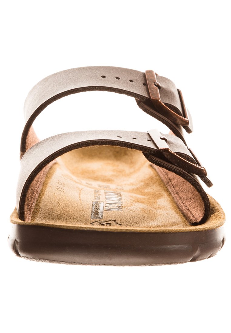 Brown leather sandals with two adjustable straps, metallic buckles, and a cushioned footbed. Textured interior with a sturdy sole.