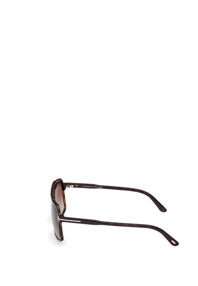 Tortoiseshell sunglasses with a geometric frame, dark gradient lenses, and thin arms featuring metal accents for stability.