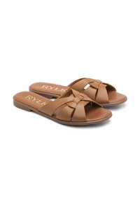 Sandali in pelle marrone con fasce incrociate e un nodo decorativo. Suola piatta con una texture liscia. Nome del marchio impresso in oro.