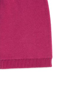 Φούξια πλεκτό ύφασμα με λείο υφή και ριμπ μανσέτα. Το υλικό παρουσιάζει ομοιόμορφο χρώμα χωρίς ορατά σχέδια ή λεπτομέρειες.