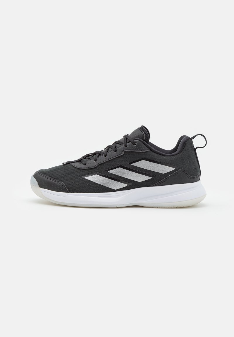 Black athletic shoe with a breathable mesh upper, reflective silver accents, and a cushioned white rubber sole. Lace-up design.