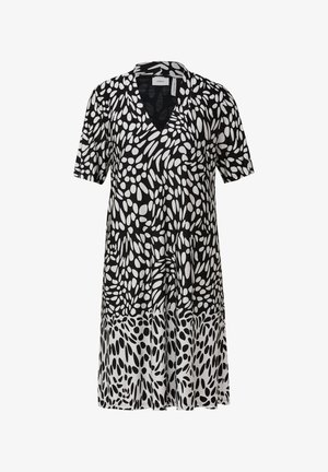 Robe noir et blanc à décolleté en V, manches courtes et design fluide avec un motif semblable à des galets sur le tissu.